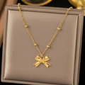 Elegante collar dorado con colgante de lazo y pequeñas cuentas, joya vintage de lujo - Dorado (C7623)