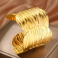 Polished 18k gold wave textured wide cuff bracelet made of stainless steel for women - Gold (F2697)