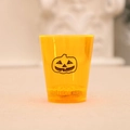 Bicchiere LED di Halloween arancione con faccia di zucca e base a prisma luminosa - Motivo di Zucca