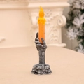 Candela LED arancione per Halloween con base a mano di scheletro gotico e teschi - Stile Giallo