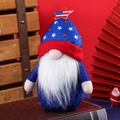 Patriotic July 4th gnome plush in blue star hat standing on vintage books decoration - Pointed Hat