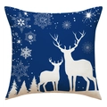 Close-up of blue linen Christmas pillowcase with white reindeer and snowflake patterns - Navy Blue Background White Reindeer Forest Pattern