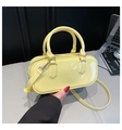 Vibrant yellow PVC jelly handbag with glossy finish and detachable shoulder strap - Yellow
