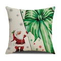 Dettaglio della federa natalizia in lino con stampa di Babbo Natale e pacchetto regalo - Motivo con Babbo Natale e Fiocco Verde (23YM152-3)