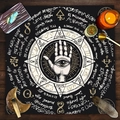 Flat lay of Hamsa Hand tarot tablecloth with crystals and candles on dark wood - Hamsa Hand (ZB1-15)