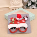 Set decorativo natalizio con occhiali glitterati rossi, mini cappello e stella d'oro - Rosso