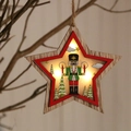 Lighted wooden star ornament with nutcracker soldier and Christmas tree motif - Five-pointed Star
