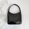 Minimalist black patent leather hobo bag with gold fashion lettering and wide strap - Black