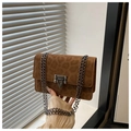 Brown suede chain bag with embossed heart leopard patterns shown in a hand-held display - Brown Leopard