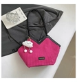 Detailed texture of magenta corduroy tote bag with black leather trim and plush charm - With Pendant / Rose Red