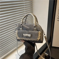 Mini grey suede crossbody bag with lace trim, bow accents, and plaid handle tie - Blue
