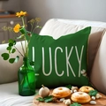 Green Saint Patrick's Day pillow with LUCKY text and shamrock print on a sofa - 45x45 / Lucky Letter Decor (YMP3-2)