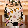 Detail of linen Happy New Year table runner with festive golden champagne and balloon prints - Beige New Year Celebration Party Style (24ZQ12-15)