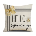 Dettaglio della stampa margherita HELLO spring e fiocco giallo su cuscino in lino - Stile Hello Spring (YMS23-1)