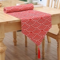 Modern red table runner featuring white wave patterns and decorative red tassels - 33*180cm / Red Fan