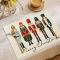 Linen Christmas placemat featuring five nutcracker soldiers and Merry Christmas text - Nutcracker Soldiers (23CD2-5)