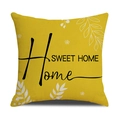 Detail of yellow cotton-linen pillow cover with floral print and Home Sweet Home text - Gnome Hibiscus Style (YMX13-4)