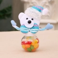 Christmas candy jar with blue plush bear decoration and colorful jelly beans inside - Bear Style