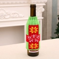 Housse de bouteille tricotée verte avec motifs flocons pour décoration de Noël - Flocon de Neige Vert