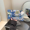 Handmade envelope clutch bag with blue and green floral sequin embroidery detail - Blue