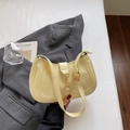 Light yellow crescent moon shoulder bag with polished PU leather and gold lobster clasp - Yellow
