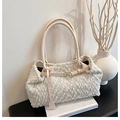 Detail of creamy white fuzzy tote bag with leather strap and gold metal buckle - Sherpa / Furry White