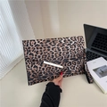 Leopard print envelope clutch bag with gold metal trim and wristlet strap - Leopard Khaki