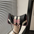Retro-Sport Boston Bag in Schwarz-Weiß gestreift mit rosa Paspel und Nummer 96 - Schwarz