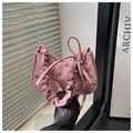 Detail of pink corduroy handbag with black bow prints and ruffled strap detail - Pink