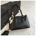 Detail of black PU leather tote with white stitching and decorative silk scarf handle - Black