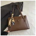 Brown tote bag detail with white contrast stitching and elegant printed handle scarf - Dark Brown