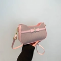 Pink chic baguette bag with bow detail and woven texture for women 2025 fashion - Pink