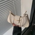 Chic cream white crescent handbag with golden metal buckle and knotted rope strap - Off White