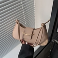Minimalist beige shoulder bag featuring golden crescent metal buckle and knotted strap - Khaki