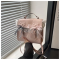 Detail of pink PU backpack with white lace edges and decorative black plaid bows - Pink