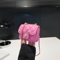 Pink quilted leather mini crossbody bag with golden chain and floral metal clasp - Pink