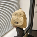 Mini-Rucksack in Pastellgelb mit Rautensteppung, Silbersteinen und Kettenriemen-Detail - Gelb