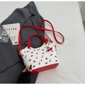 Mini borsa bianca con stampa ciliegie e manici in pelle rossa su un blazer grigio - Rosso Vino con Ciondolo