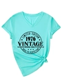 Detail van mintgroen T-shirt met V-hals en Limited Edition 1976 vintage grafische print - S / Muntgroen (Zwart Lettertype)