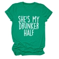 Flat lay of a green crew neck T-shirt featuring She's My Drunker Half white typography - Dark Green (White Font)