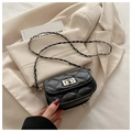 Classic black quilted mini crossbody bag with silver chain strap and metal turn-lock - Black