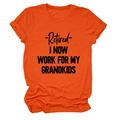 Detail of a bright orange T-shirt with black Retired I Now Work For My Grandkids text - Orange (Black Font)