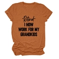 Close-up of rust-red T-shirt texture and Retired I Now Work For My Grandkids slogan print - Burnt Orange (Black Font)