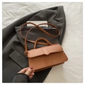 Brown faux leather handbag with a top handle and V-shaped stitch detail for women - Brown