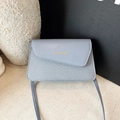 Morandi light blue crossbody flap bag with textured weave and gold lettering - Blue