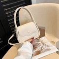 Elegante bolso de silla color crema con textura de lichi y detalle de asa redonda - Blanco
