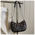 Detail of black crescent shoulder bag with cherry print and silver chain strap - Black