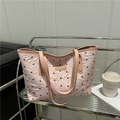 Borsa tote rosa con stampe di fiocchi neri e trama trapuntata con spalline in pelle - Rosa