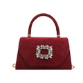 Burgundy velvet handbag with square crystal buckle and gold chain strap in a frontal view - Red