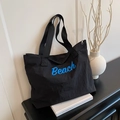 Sac fourre-tout noir en nylon avec imprimé Beach bleu et bandoulière sur meuble - Noir